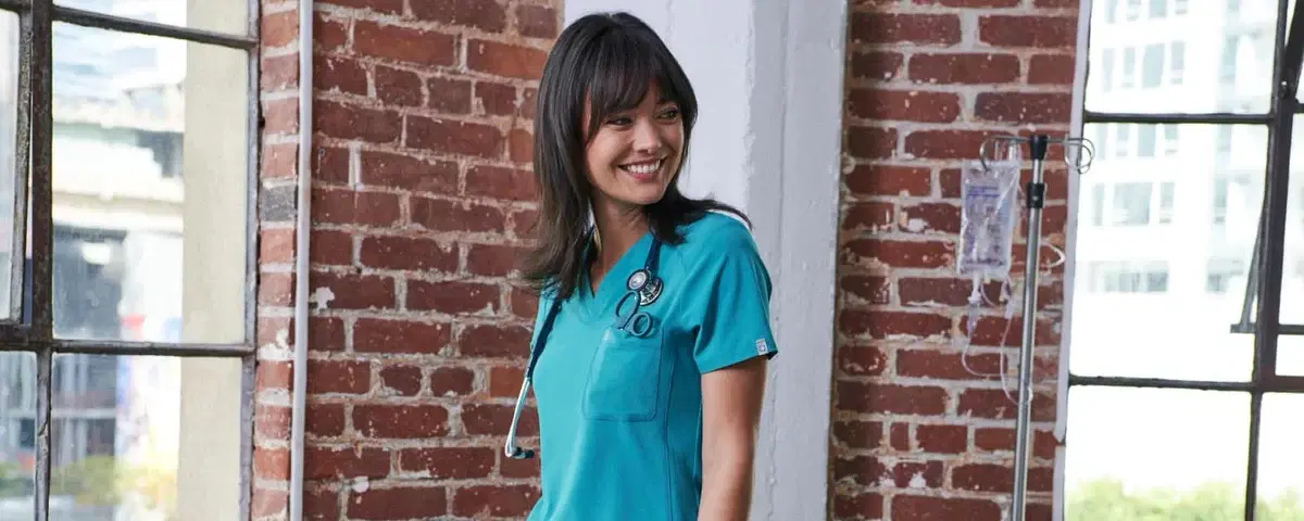 Cherokee Infinity scrub top — soft stretch clinical wear